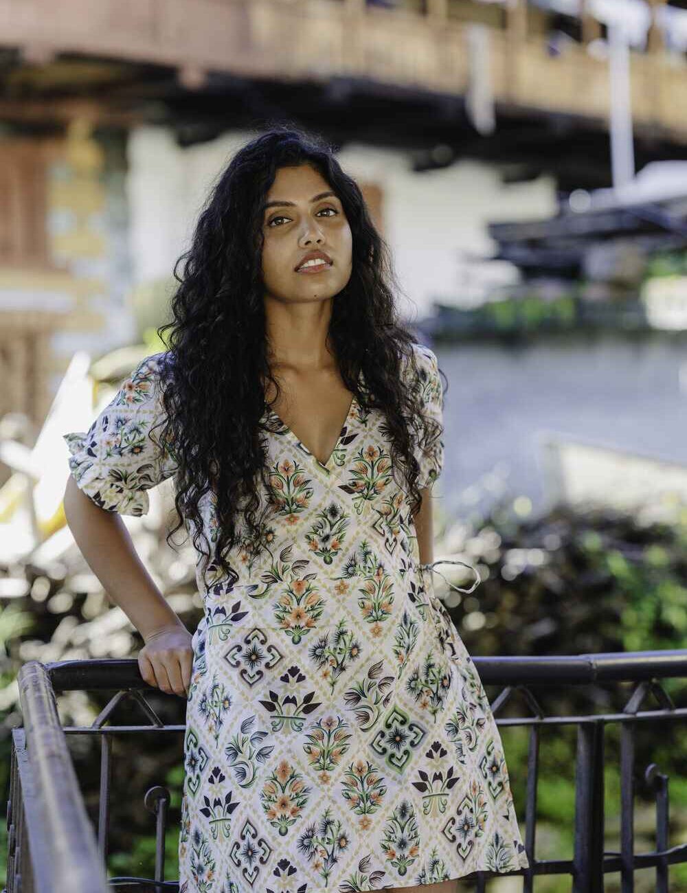 Model wearing an off-white Chanderi short dress in a wrap-around style, perfect for a casual dress look in warm weather.