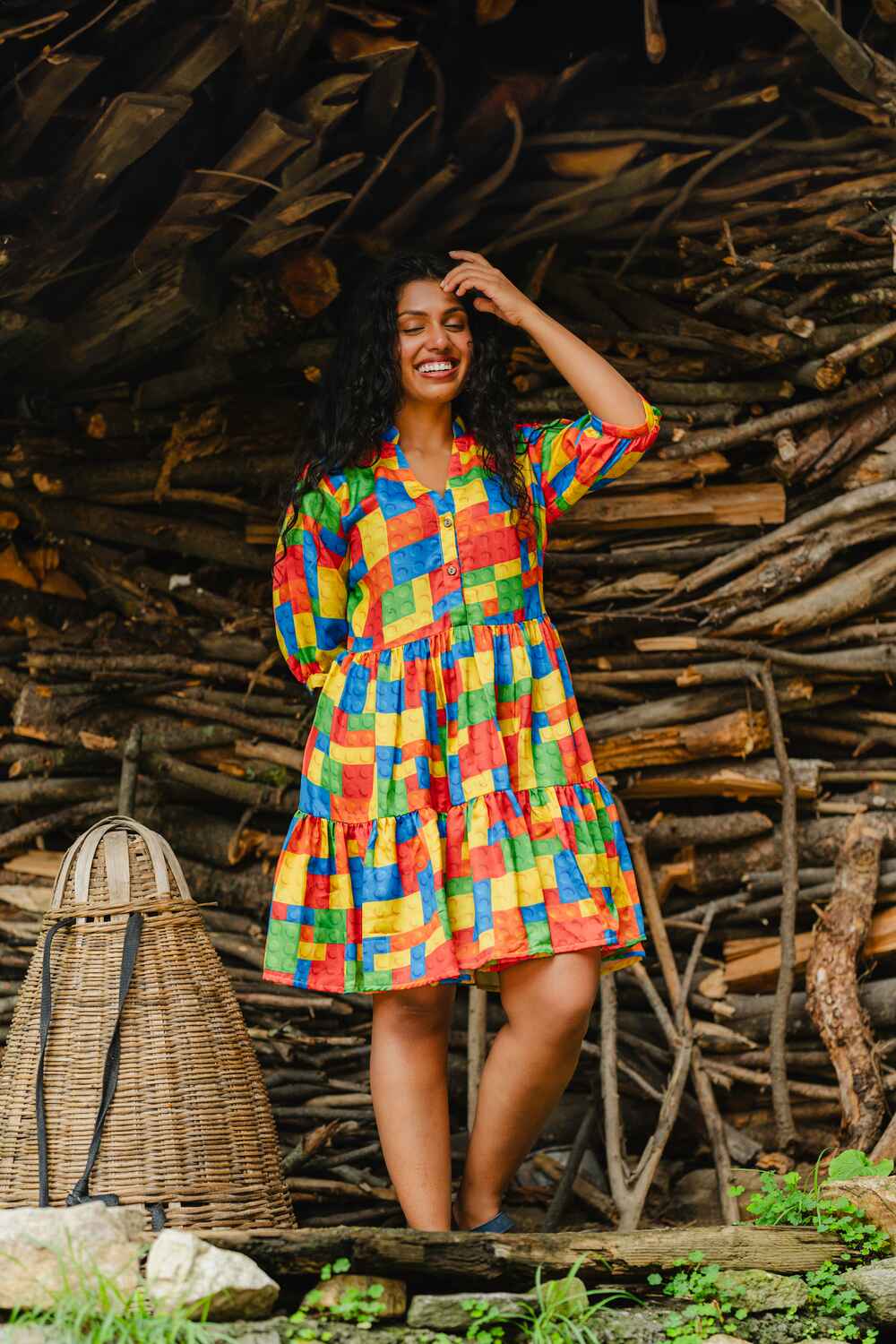 Model wearing a multi-colored, full-sleeve short dress in baby satin fabric, designed for both style and comfort.