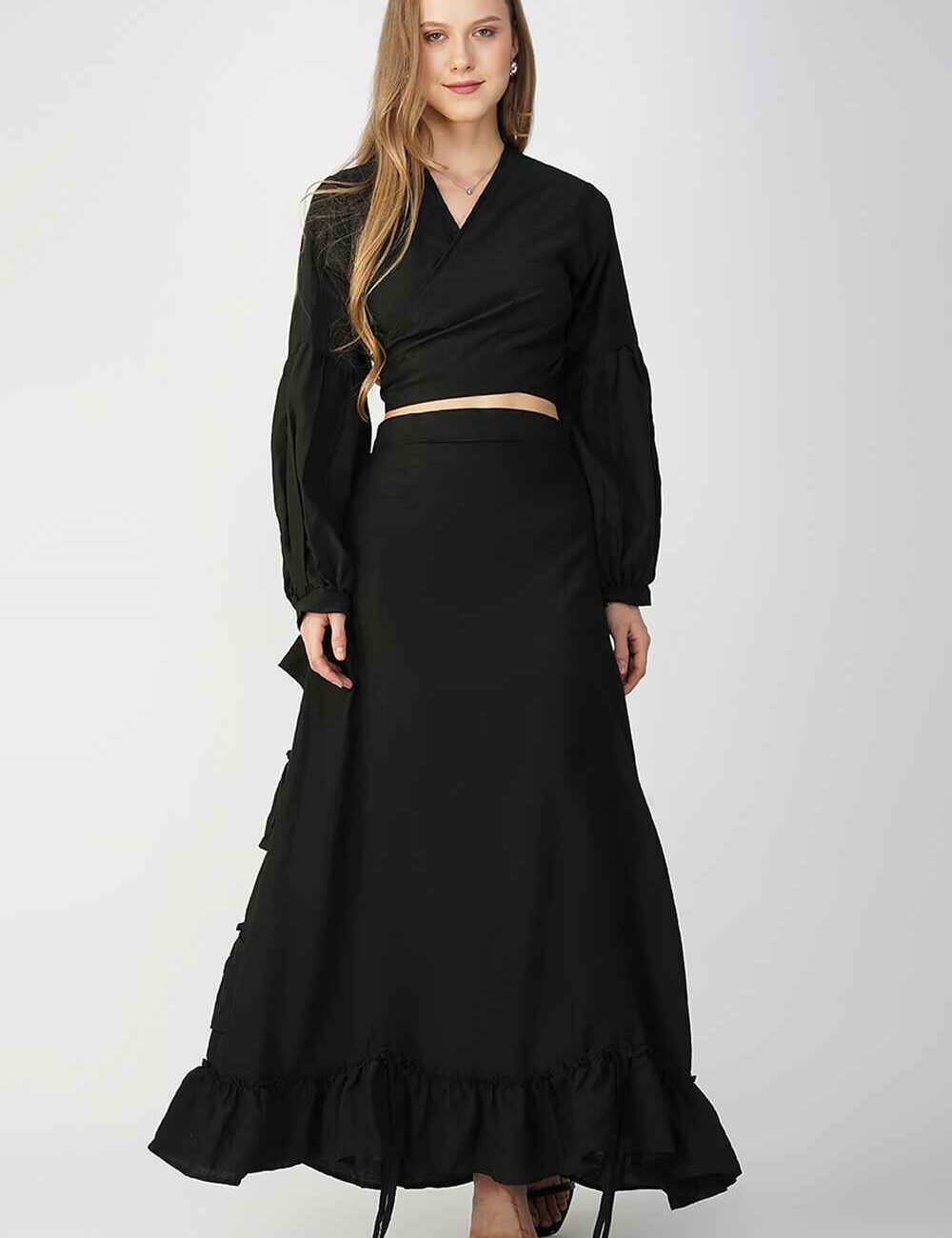 Black cotton-linen skirt with ruffled hem offering a versatile and elegant style