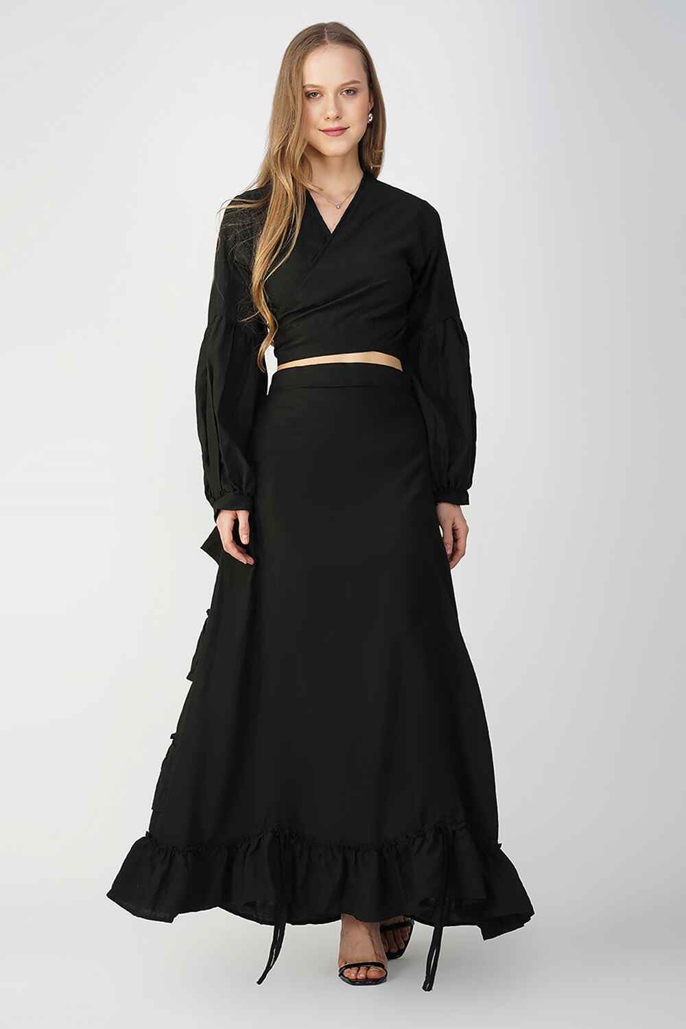 Black cotton-linen skirt with ruffled hem offering a versatile and elegant style